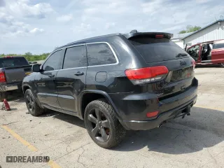 2015 Jeep Grand Cherokee Laredo with VIN 1C4RJFAG5FC724874, listed as a Copart auction lot 52462214 with 99,650 mi miles and Salvage Title. Bid and sale history available at carsss.com. Image 2.