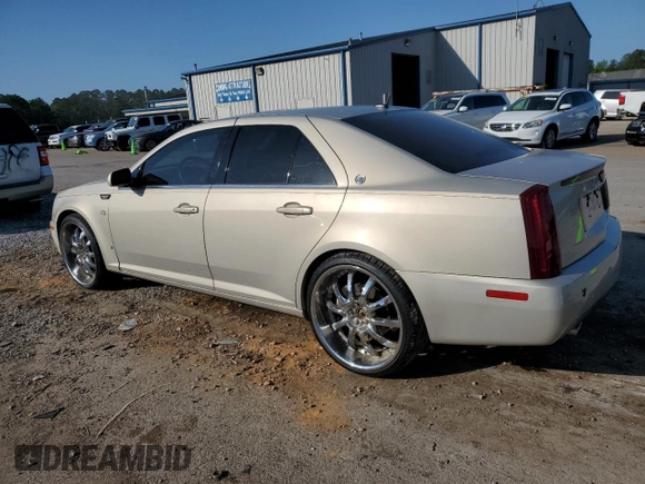 2007 Cadillac STS z VIN 1G6DW677970151227, wystawiony jako Copart lot #52345265 z przebiegiem 154 790 mil mil oraz Szkoda całkowita • Salvage title. Historia ofert i sprzedaży dostępna na DreamBid. Obrazek 2.