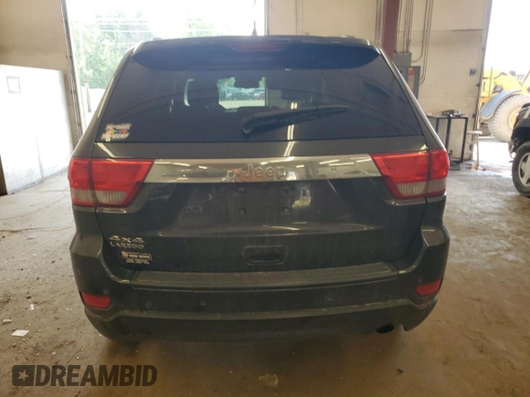 2011 Jeep Grand Cherokee Laredo with VIN 1J4RR4GG6BC641138, listed as a Copart auction lot 60209955 with 218,235 mi miles and Clean title. Bid and sale history available at DreamBid. Image 6.