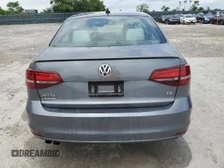 2017 Volkswagen Jetta Sport with VIN 3VWD17AJ9HM405584, listed as a Copart auction lot 57512375 with 128,484 mi miles and Salvage title. Bid and sale history available at DreamBid. Image 6.