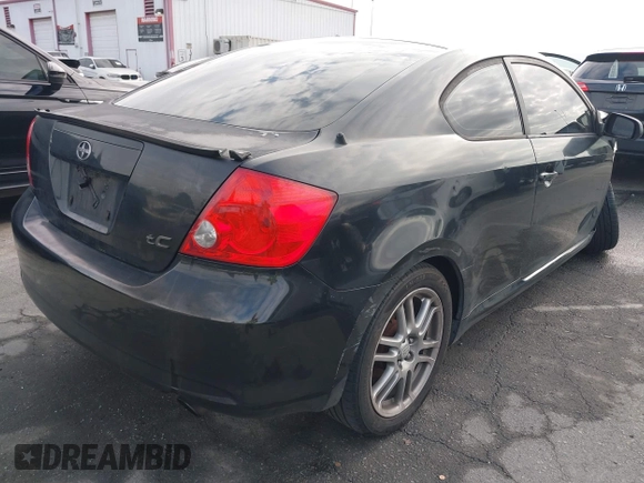 2007 Scion tC Spec with VIN JTKDE167070155986, listed as a IAAI auction lot 42062910 with 198,049 mi miles. Bid and sale history available at carsss.com. Image 4.