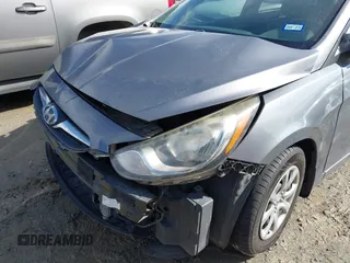 2014 Hyundai Accent GLS with VIN KMHCT4AEXEU710606, listed as a IAAI auction lot 41764163 with 103,859 mi miles. Bid and sale history available at carsss.com. Image 6.