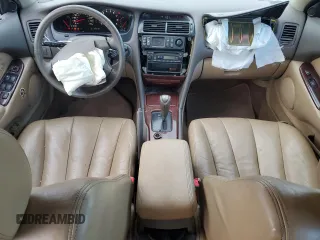 2002 Mitsubishi Diamante LS z VIN 6MMAP67P62T018175, wystawiony jako Copart lot #52052285 z przebiegiem 182 739 mil mil oraz Szkoda całkowita • Salvage title. Historia ofert i sprzedaży dostępna na DreamBid. Obrazek 8.