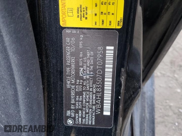 2007 BMW 7 Series 750i with VIN WBAHL83507DT07958, listed as a Copart auction lot 73318944 with 127,698 mi miles and Salvage Title. Bid and sale history available at DreamBid. Image 12.