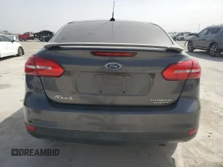 2016 Ford Focus Titanium with VIN 1FADP3J20GL274263, listed as a Copart auction lot 48340175 with 114,941 mi miles and Salvage title. Bid and sale history available at DreamBid. Image 6.