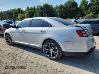 2014 Ford Taurus Limited with VIN 1FAHP2F89EG165301, listed as a Copart auction lot 63856455 with 160,439 mi miles and Clean title. Bid and sale history available at DreamBid. Image 2.