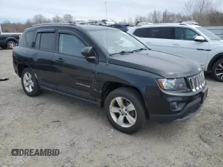 2016 Jeep Compass Sport with VIN 1C4NJDBB1GD756450, listed as a Copart auction lot 50776255 with 136,937 mi miles and Salvage Title. Bid and sale history available at carsss.com. Image 4.