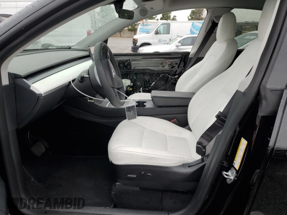 2021 Tesla Model Y Long Range with VIN 5YJYGDEEXMF294556, listed as a Copart auction lot 46668035 with 42,772 mi miles and Salvage Title. Bid and sale history available at DreamBid. Image 7.