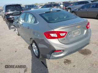 2017 Chevrolet Cruze LT with VIN 1G1BE5SM1H7165431, listed as a IAAI auction lot 41777097 with 101,321 mi miles and . Bid and sale history available at DreamBid. Image 3.