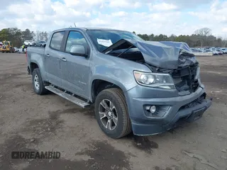 2018 Chevrolet Colorado 4WD Z71 z VIN 1GCGTDENXJ1133572, wystawiony jako IAAI lot #41437941 z przebiegiem 82 254 mil mil oraz . Historia ofert i sprzedaży dostępna na DreamBid. Obrazek 1.