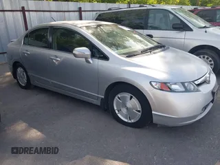 2007 Honda Civic z VIN JHMFA36217S004850, wystawiony jako IAAI lot #42544238 z przebiegiem 143 861 mil mil oraz . Historia ofert i sprzedaży dostępna na DreamBid. Obrazek 1.