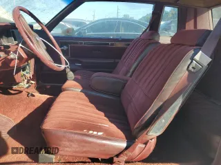 1984 Oldsmobile Cutlass Supreme z VIN 1G3AR47A5EM432583, wystawiony jako Copart lot #82311834 z przebiegiem 39 640 mil mil oraz Czysty tytuł • Clean title. Historia ofert i sprzedaży dostępna na DreamBid. Obrazek 7.