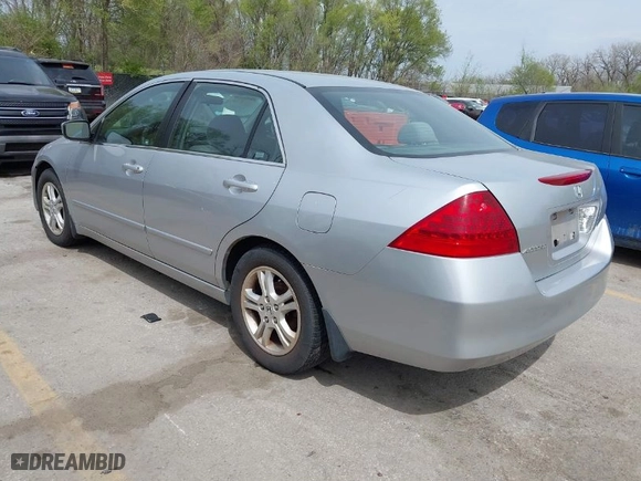 2007 Honda Accord Sdn LX SE with VIN JHMCM56327C013663, listed as a IAAI auction lot 42005628 with 167,927 mi miles. Bid and sale history available at carsss.com. Image 3.