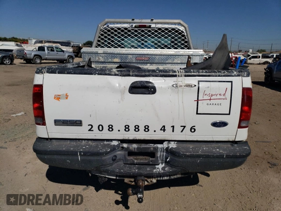 2005 Ford Super Duty F-250 XL with VIN 1FTNX20515EC46784, listed as a Copart auction lot 73200624 with 156,936 mi miles and Salvage Title. Bid and sale history available at carsss.com. Image 6.