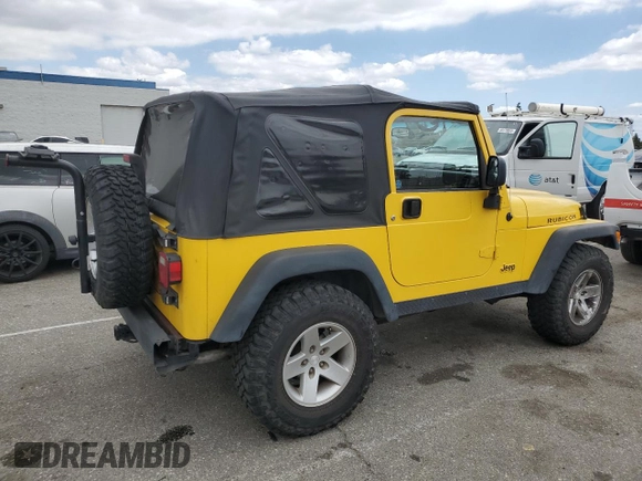 2004 Jeep Wrangler Rubicon with VIN 1J4FA69SX4P768963, listed as a Copart auction lot 56999665 with 91,949 mi miles and Salvage title. Bid and sale history available at DreamBid. Image 3.