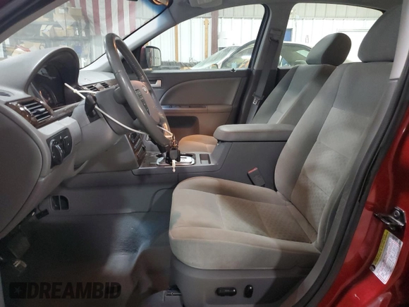 2005 Ford Five Hundred SEL with VIN 1FAFP24195G194679, listed as a Copart auction lot 79450804 with 98,954 mi miles and Salvage Title. Bid and sale history available at carsss.com. Image 7.