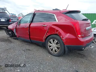 2015 Cadillac SRX Luxury Collection z VIN 3GYFNBE35FS574812, wystawiony jako IAAI lot #42037577 z przebiegiem 94 727 mil mil oraz . Historia ofert i sprzedaży dostępna na DreamBid. Obrazek 3.