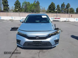 2022 Honda Civic Sedan EX with VIN 2HGFE1F77NH309152, listed as a IAAI auction lot 42013565 with 25,474 mi miles. Bid and sale history available at carsss.com. Image 13.
