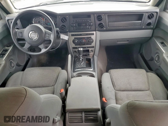 2007 Jeep Commander Sport z VIN 1J8HG48K27C697717, wystawiony jako Copart lot #53550395 z przebiegiem 288 452 mil mil oraz Szkoda całkowita • Salvage title. Historia ofert i sprzedaży dostępna na DreamBid. Obrazek 8.