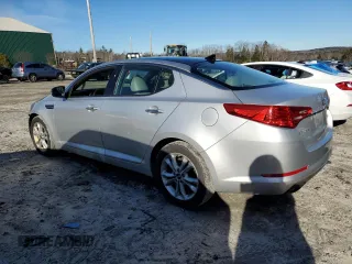 2011 Kia Optima EX with VIN KNAGN4A69B5175800, listed as a Copart auction lot 80205734 with 104,218 mi miles and Salvage Title. Bid and sale history available at carsss.com. Image 2.