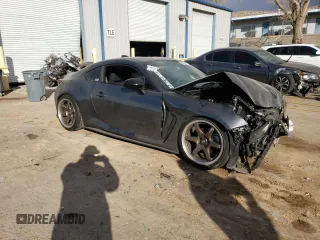 2023 Toyota GR86 with VIN JF1ZNBC19P8751513, listed as a Copart auction lot 43288945 with 19,673 mi miles and Salvage Title. Bid and sale history available at carsss.com. Image 4.