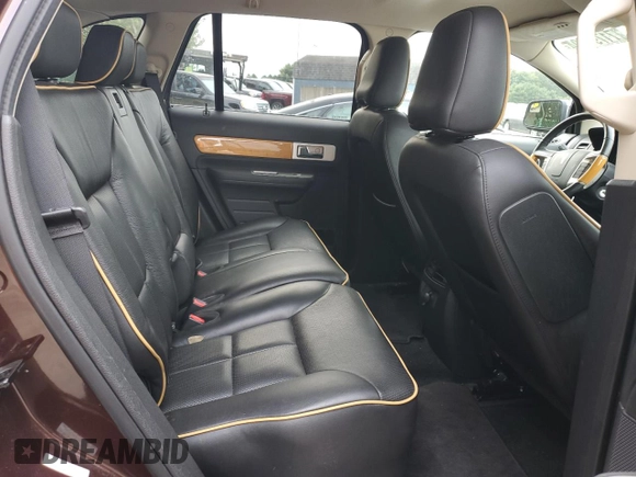 2010 Lincoln MKX with VIN 2LMDJ8JC9ABJ30736, listed as a Copart auction lot 71791594 with 116,083 mi miles and Salvage Title. Bid and sale history available at DreamBid. Image 12.