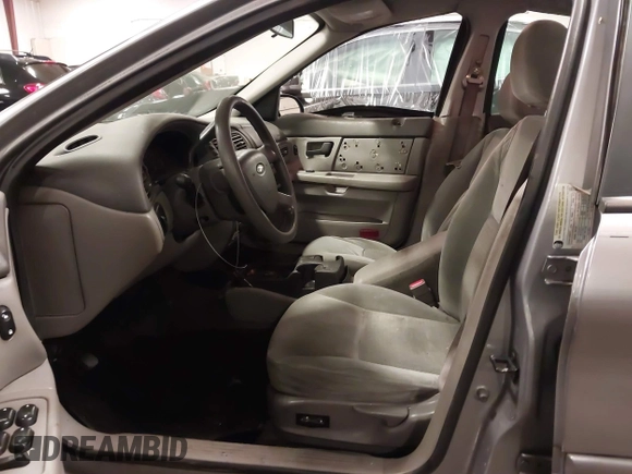 2006 Ford Taurus SE with VIN 1FAFP53U86A113947, listed as a IAAI auction lot 41753927 with 203,867 mi miles. Bid and sale history available at carsss.com. Image 5.