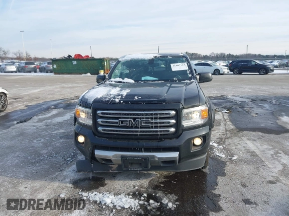 2015 GMC Canyon 4WD SLE z VIN 1GTG6BE31F1270675, wystawiony jako IAAI lot #41407183 z przebiegiem 143 117 mil mil oraz . Historia ofert i sprzedaży dostępna na DreamBid. Obrazek 12.