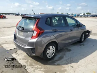 2015 Honda Fit LX с VIN 3HGGK5H59FM757797, выставлен на аукционе Copart как лот 58615175 с пробегом 109 608 миль миль и Списание • Salvage title. История ставок и продаж доступна на DreamBid. Изображение 3.