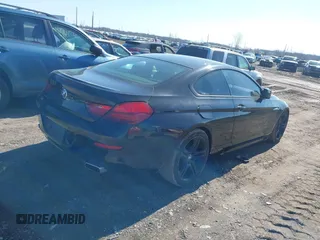 2012 BMW 6 Series 650i xDrive with VIN WBALX5C59CC894030, listed as a IAAI auction lot 41763126 with 115,562 mi miles and . Bid and sale history available at carsss.com. Image 4.