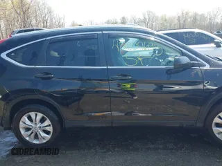 2014 Honda CR-V EX-L with VIN 2HKRM4H76EH673891, listed as a IAAI auction lot 42009693 with 103,798 mi miles. Bid and sale history available at carsss.com. Image 13.