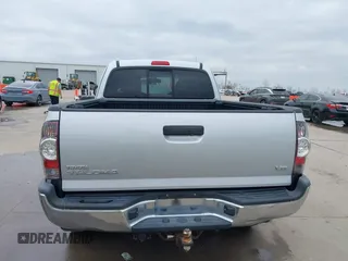 2013 Toyota Tacoma with VIN 5TFUU4EN1DX065356, listed as a IAAI auction lot 41509219 with 122,520 mi miles and . Bid and sale history available at DreamBid. Image 16.