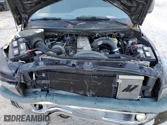 1999 Dodge Ram 2500 with VIN 3B7KC2367XG112716, listed as a Copart auction lot 84625064 with 311,211 mi miles and Salvage Title. Bid and sale history available at carsss.com. Image 12.
