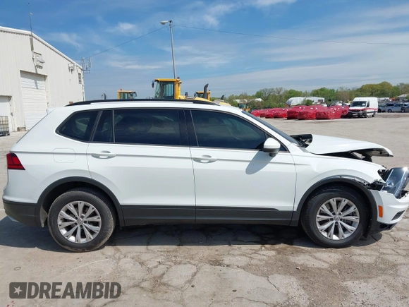 2019 Volkswagen Tiguan S with VIN 3VV0B7AX0KM027036, listed as a IAAI auction lot 42202681 with 75,192 mi miles and . Bid and sale history available at DreamBid. Image 14.
