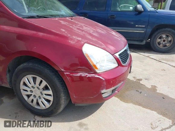 2014 Kia Sedona LX with VIN KNDMG4C71E6564595, listed as a IAAI auction lot 42015687 with 208,270 mi miles. Bid and sale history available at carsss.com. Image 6.
