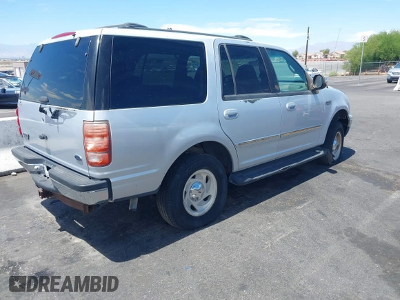 1999 Ford Expedition XLT z VIN 1FMPU18L8XLA69627, wystawiony jako IAAI lot #42847569 z przebiegiem Nie podano mil oraz . Historia ofert i sprzedaży dostępna na DreamBid. Obrazek 4.