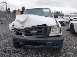 2006 Ford Ranger XL with VIN 1FTZR15E66PA78130, listed as a IAAI auction lot 41296599 with 204,905 mi miles. Bid and sale history available at carsss.com. Image 12.