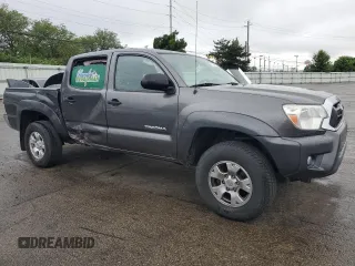 2013 Toyota Tacoma with VIN 5TFLU4EN9DX076018, listed as a Copart auction lot 57248765 with 187,475 mi miles and Salvage title. Bid and sale history available at DreamBid. Image 4.