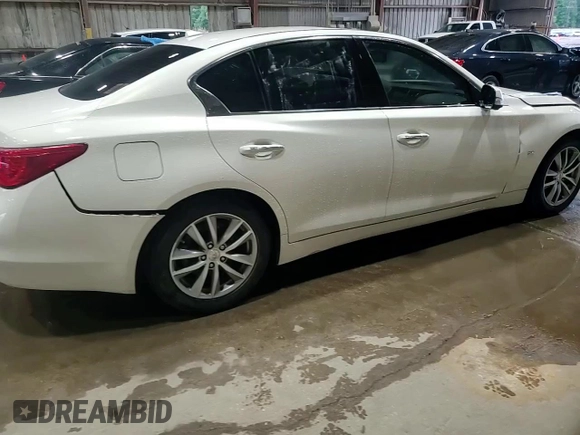 2015 Infiniti Q50 Premium z VIN JN1BV7AP1FM336551, wystawiony jako Copart lot #56077035 z przebiegiem 91 244 mil mil oraz Szkoda całkowita • Salvage title. Historia ofert i sprzedaży dostępna na DreamBid. Obrazek 13.