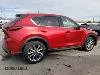 2021 Mazda CX-5 Grand Touring Reserve with VIN JM3KFBAY4M0358478, listed as a Copart auction lot 50839815 with 84,932 mi miles and Salvage Title. Bid and sale history available at DreamBid. Image 3.