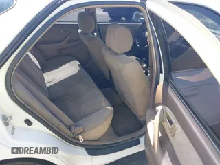 1999 Toyota Camry LE z VIN 4T1BG22K0XU904122, wystawiony jako IAAI lot #42305293 z przebiegiem 243 182 mil mil oraz . Historia ofert i sprzedaży dostępna na DreamBid. Obrazek 8.