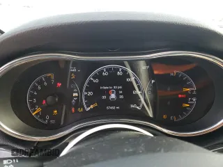 2021 Jeep Grand Cherokee Trailhawk with VIN 1C4RJFLG0MC525273, listed as a Copart auction lot 49632275 with 57,452 mi miles and Salvage title. Bid and sale history available at DreamBid. Image 9.
