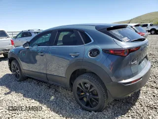 2023 Mazda CX-30 S Carbon Edition with VIN 3MVDMBCM1PM524019, listed as a Copart auction lot 57079355 with 46,737 mi miles and Salvage title. Bid and sale history available at DreamBid. Image 2.