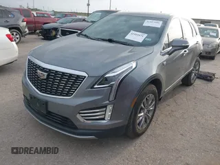 2021 Cadillac XT5 FWD Premium Luxury with VIN 1GYKNCRS5MZ128908, listed as a IAAI auction lot 41919571 with 51,280 mi miles and . Bid and sale history available at carsss.com. Image 18.