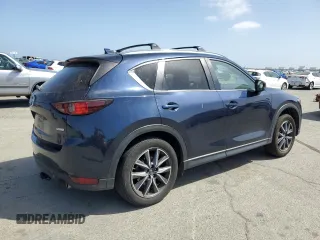 2018 Mazda CX-5 Touring with VIN JM3KFACM6J1323449, listed as a Copart auction lot 54090445 with 93,748 mi miles and Salvage Title. Bid and sale history available at carsss.com. Image 3.