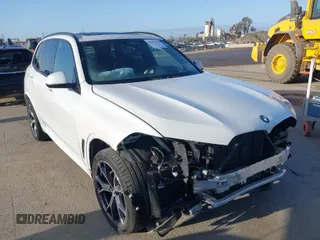 2022 BMW X5 sDrive40i with VIN 5UXCR4C0XN9N25946, listed as a IAAI auction lot 41957291 with 34,286 mi miles. Bid and sale history available at carsss.com. Image 1.