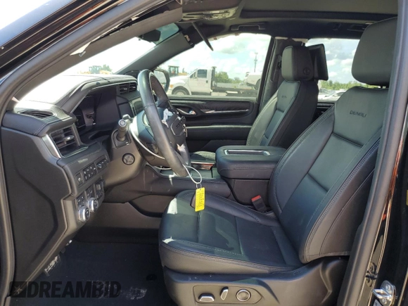 2023 GMC Yukon XL Denali with VIN 1GKS2JKT2PR438920, listed as a Copart auction lot 69749244 with 23,817 mi miles and Salvage Title. Bid and sale history available at DreamBid. Image 7.