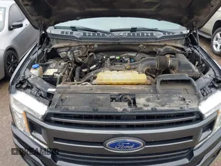 2019 Ford F-150 XL with VIN 1FTEW1EP7KKF18114, listed as a IAAI auction lot 41957860 with 106,017 mi miles and . Bid and sale history available at DreamBid. Image 10.