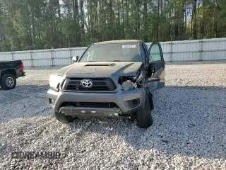 2015 Toyota Tacoma PreRunner with VIN 3TMJU4GN5FM180924, listed as a Copart auction lot 50864315 with 176,562 mi miles and Salvage title. Bid and sale history available at DreamBid. Image 11.