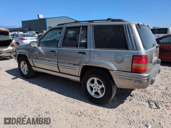 1998 Jeep Grand Cherokee Limited z VIN 1J4GZ88Z8WC306919, wystawiony jako Copart lot #61505725 z przebiegiem 195 329 mil mil oraz Czysty tytuł • Clean title. Historia ofert i sprzedaży dostępna na DreamBid. Obrazek 2.